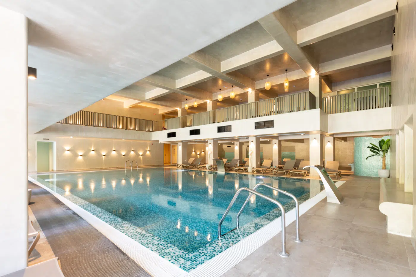Indoor commercial swimming pool hall with modern circulation infrastructure
